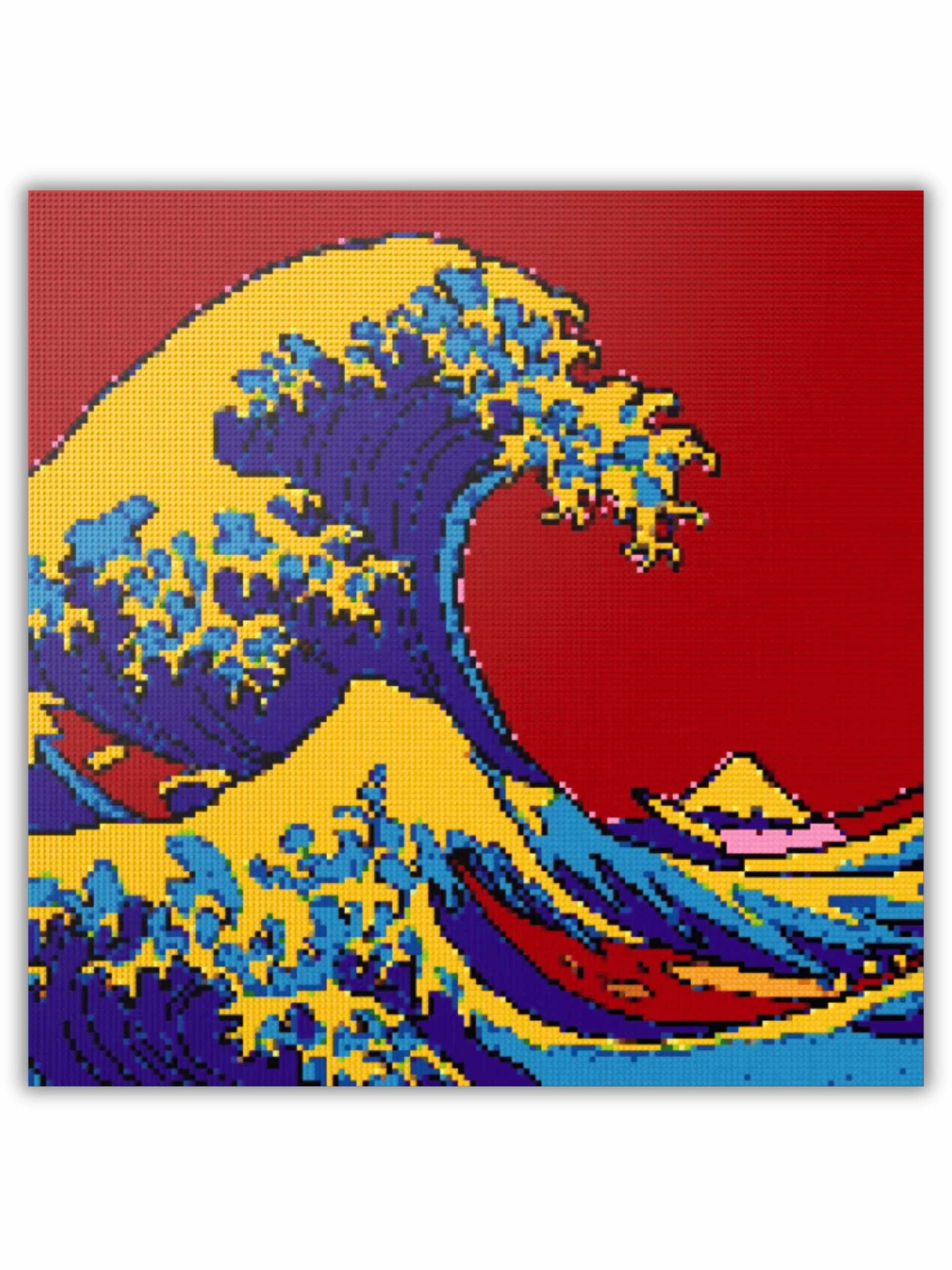 Pop art reinterpretation of The Great Wave of Kanagawa as a large-scale LEGO®-compatible brick mosaic in bold red, yellow and deep blue tones, designed as modern cultural wall art and creative interior decor.