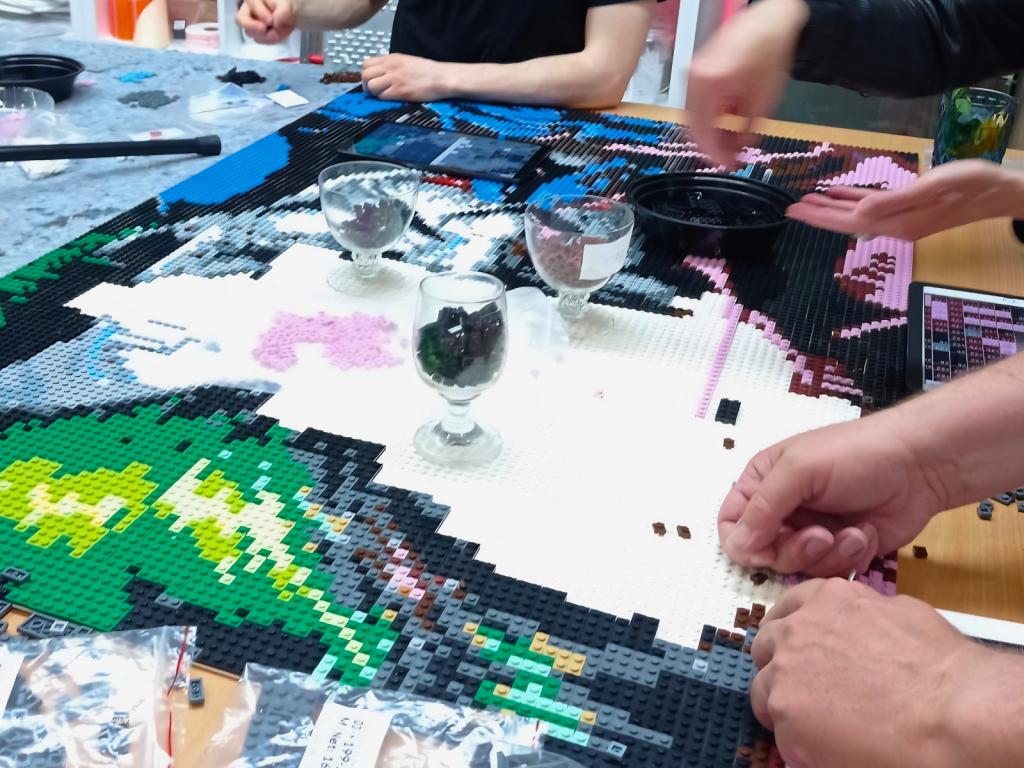 Participants sharing a creative experience during a Mosaic Night event at Kreativwerk Hamburg