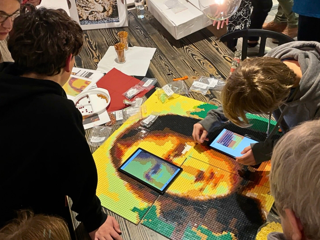 Digital mosaic building guide used during a Pixel Art Social Club creative experience at Kreativwerk Hamburg